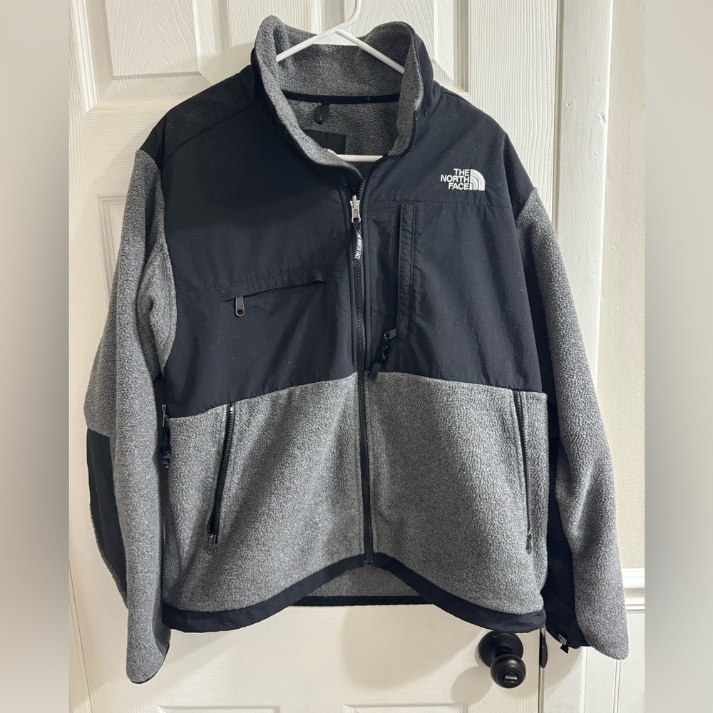 Black and grey North Face Denali jacket.